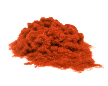 Pile of 1mm Burnt Orange loose flock Fibres