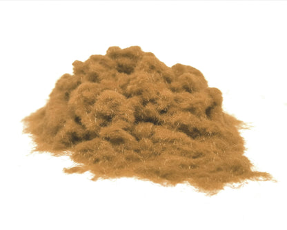 Close-up of a soft, textured pile of Arena Brown 1mm nylon flock fibres, used for DIY flocking projects.