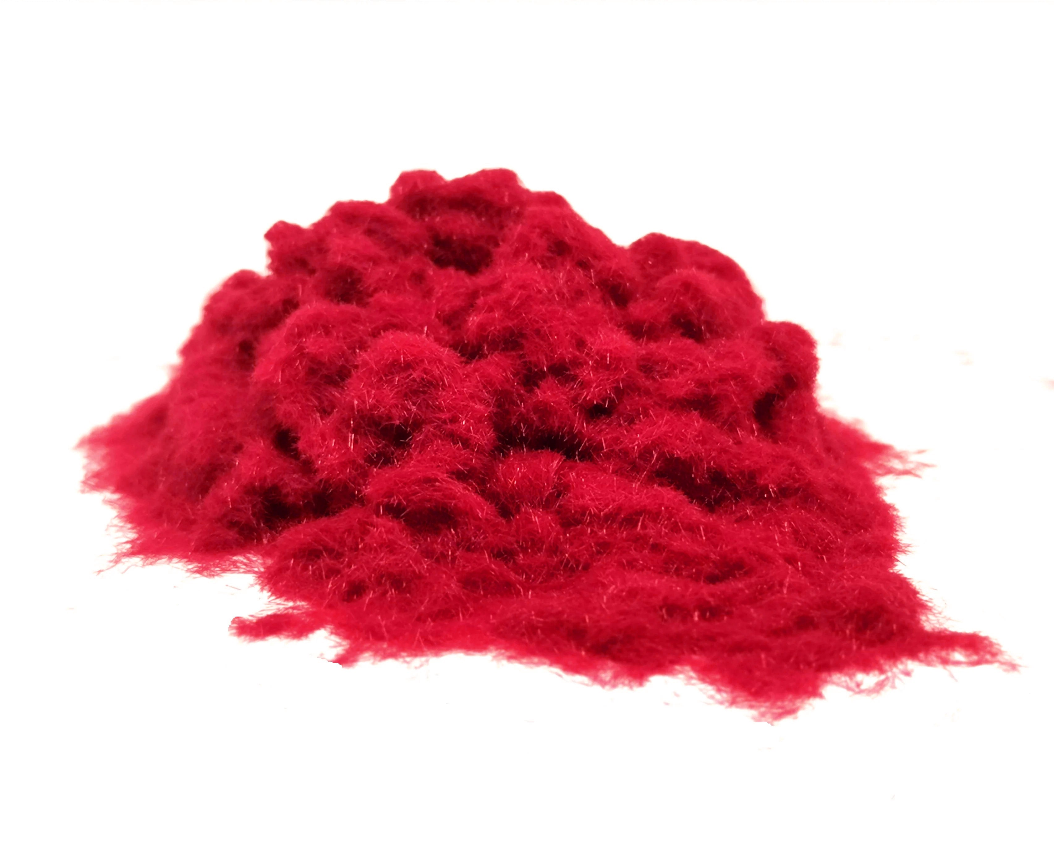 Close-up of a soft, textured pile of Chilli Red 1mm nylon flock fibres, used for DIY flocking projects.